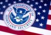 U.S. Department of Homeland Security seal on American flag