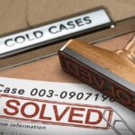 Rubber stamp marks solved on a case file