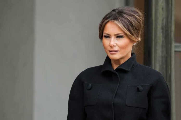 shutterstock_1232034112 Melania Trump in a black coat looking to the side