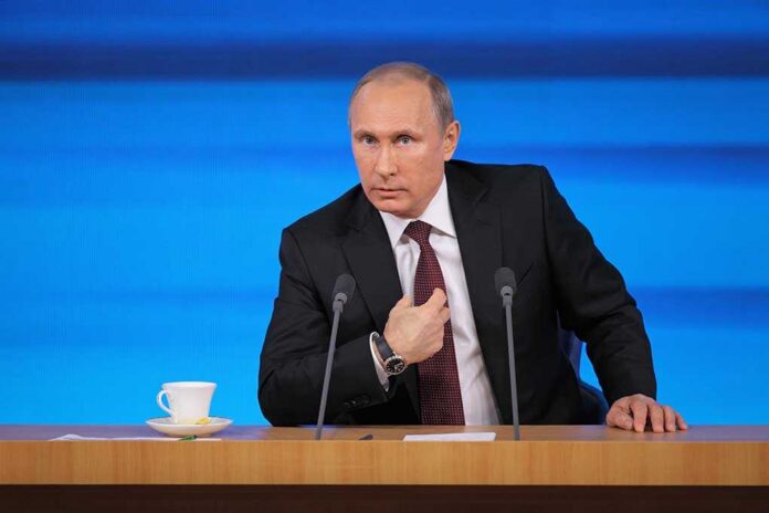Moscow,,Russia,-,Dec,19,,2013:,The,President,Of,The Vladimir Putin at a podium with two microphones