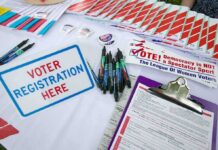 This Video of El-Sayed From 2018 Could Do Some Serious Damage to His Campaign Voter registration table with forms, pens, and informational materials