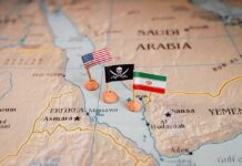 Map with US, pirate, and Iran flags near the Red Sea