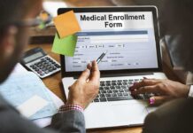 Talarico Changes Excuse After He’s Missing For 2-Weeks Laptop displaying a medical enrollment form with two people reviewing it
