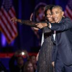 Dems Tote ‘Secret Weapon’ NOBODY Wanted Michelle Obama and Rob Nabors pointing on stage at an event